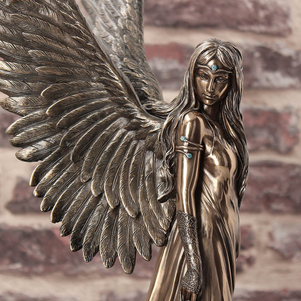 Bronze statue of an angel with detailed wings Gothic fantasy angel home décor on display
