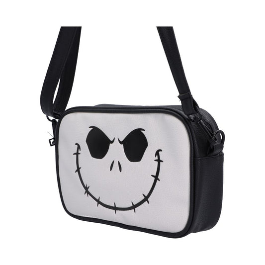 Side view of Jack Skellington Nightmare Before Christmas bag, a black and white crossbody bag featuring a stylized Jack Skellington face printed on the front.