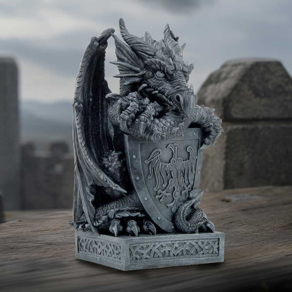 Ironshield Guardian medieval black dragon figurine perched atop a medieval-style shield and mounted on a rectangular base fantasy dragon collectible on display