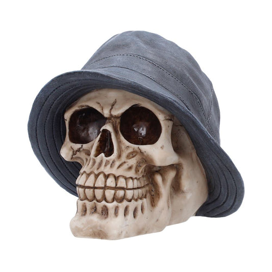 Side view of Mad For It skull figurine