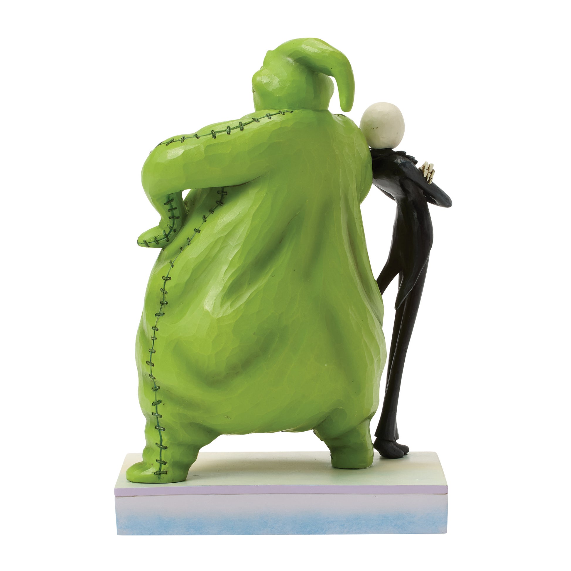 Rear view of the Jack Skellington and Oogie Boogie Figurine by Disney Traditions showing the detailed backs of both characters and Jim Shore's intricate folk-art patterns.