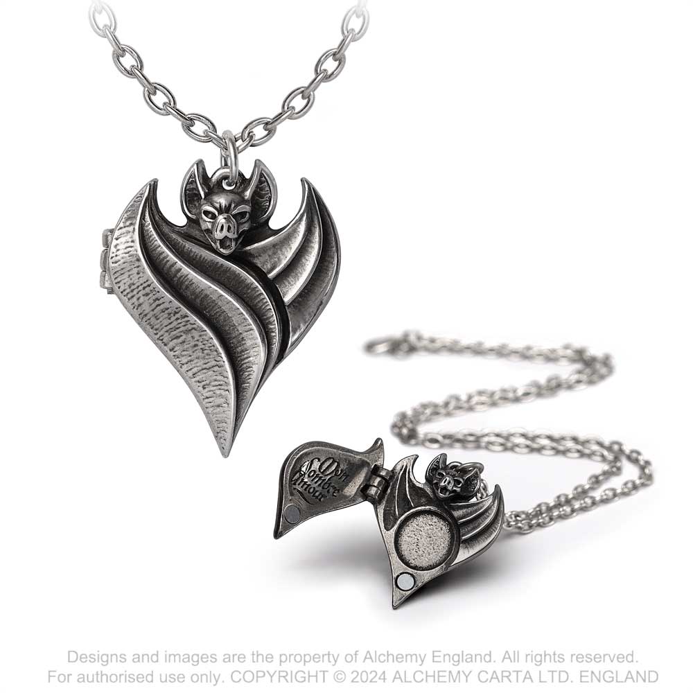 Gothic bat locket necklace with heart-shaped design. Close-up of gothic bat heart necklace detail.