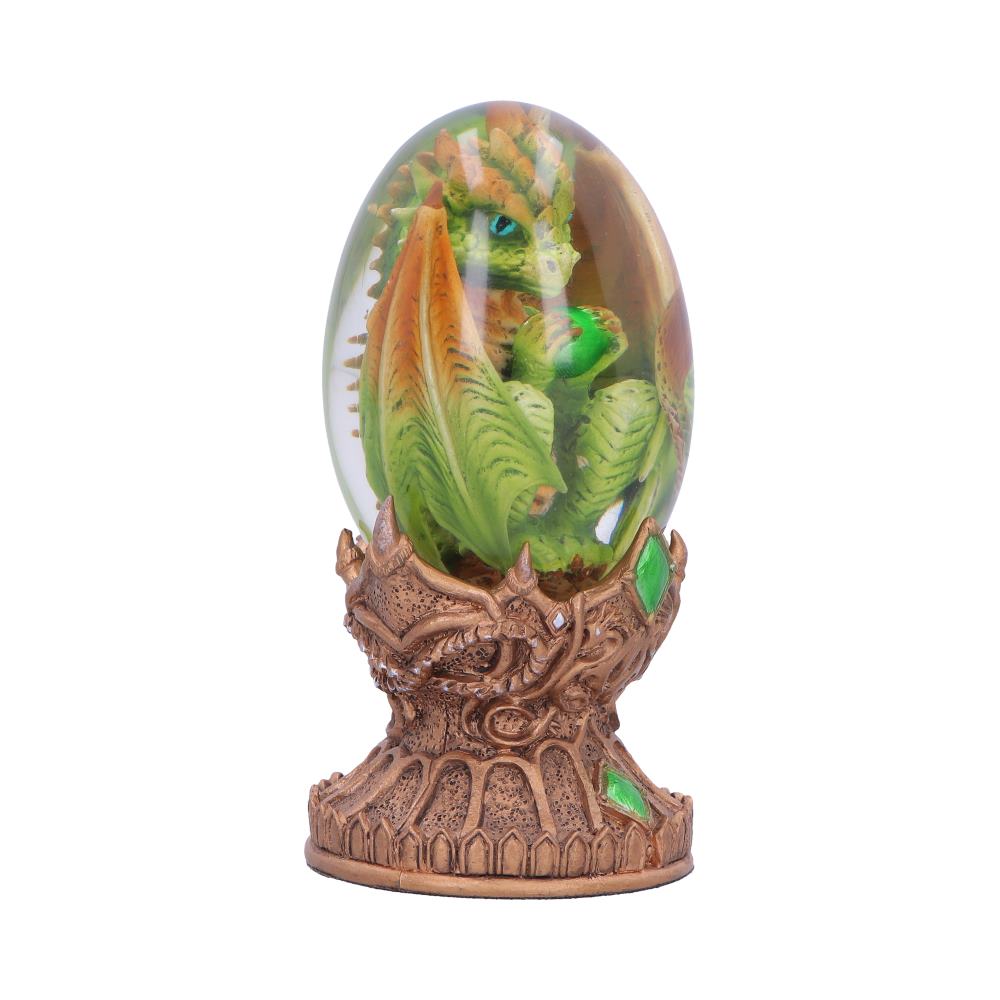Green dragon in crystal egg