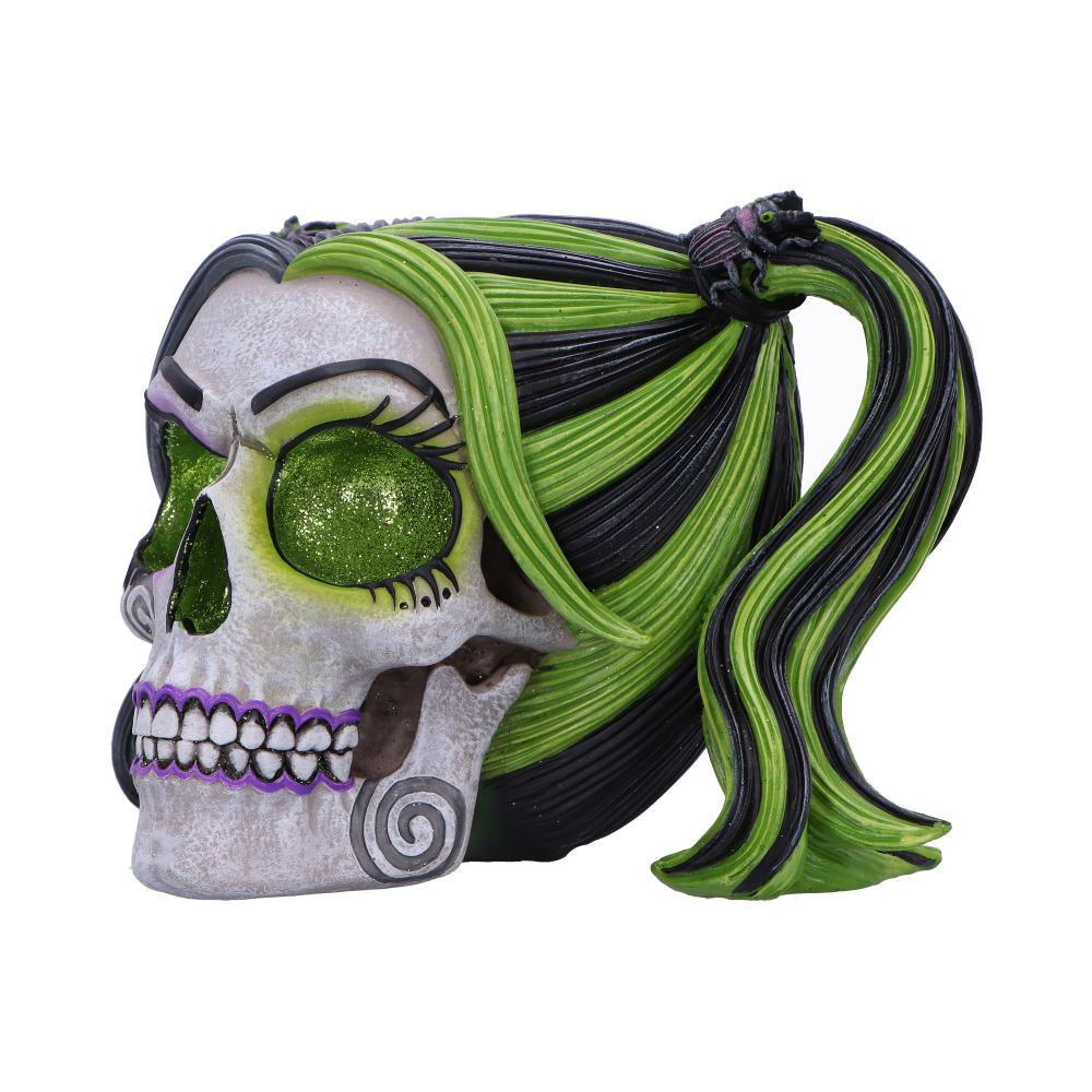Side view of hand-painted gothic Beetles and Bugs skull figurine