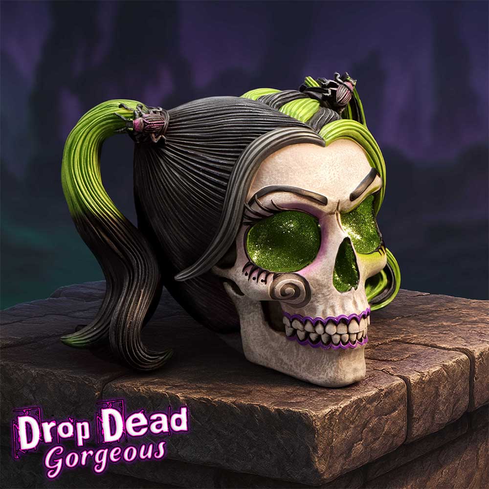 Skull with green and black hair styled like a ponytail, with green glitter eyes with 'Drop Dead Gorgeous' branding.