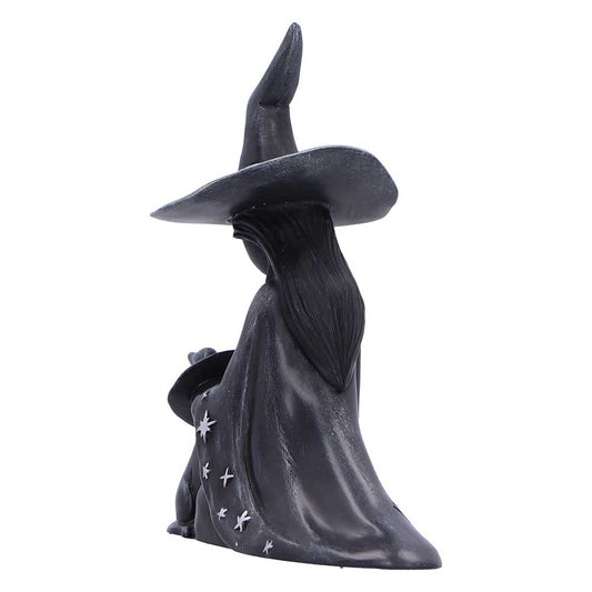 Statue of a witch with a wide-brimmed hat and long cloak
