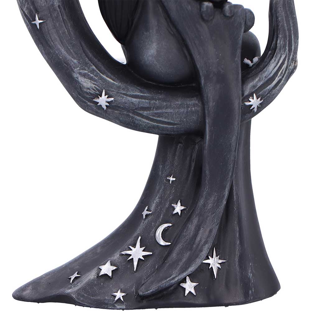 Crescent moon figurine with silver accent detailing