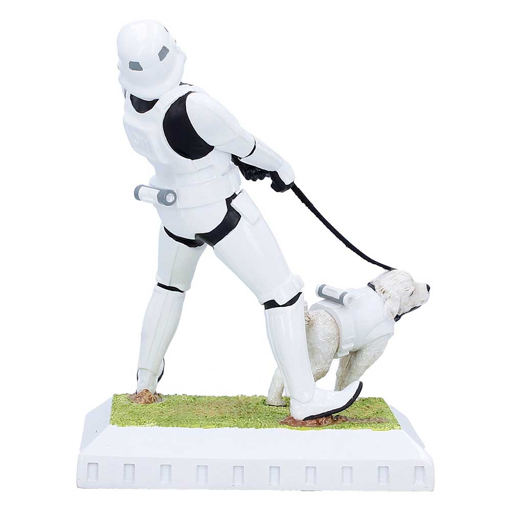Statue of a stormtrooper from Star Wars walking a dog