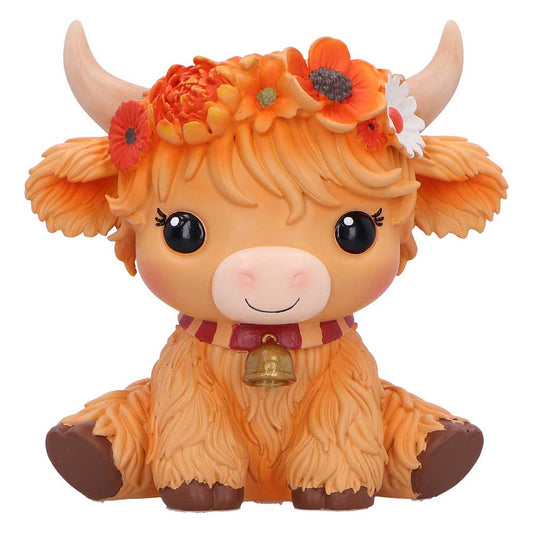 Orange cow with a flower crown and bell