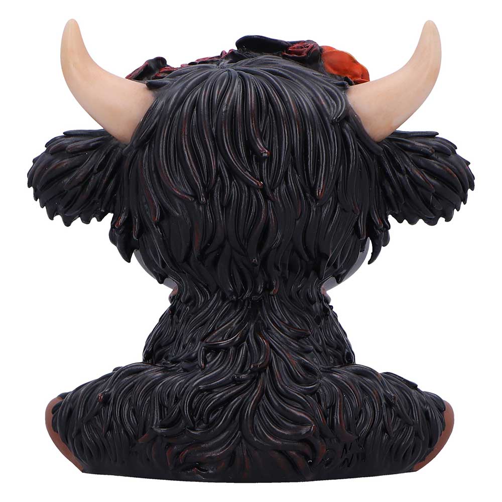 Black furry creature with large horns