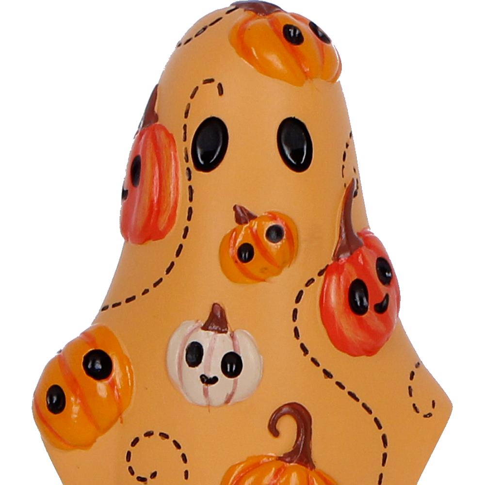 Close-up of the sweet expressions on the pumpkins decorating Herbert the Halloween ghost figurine.