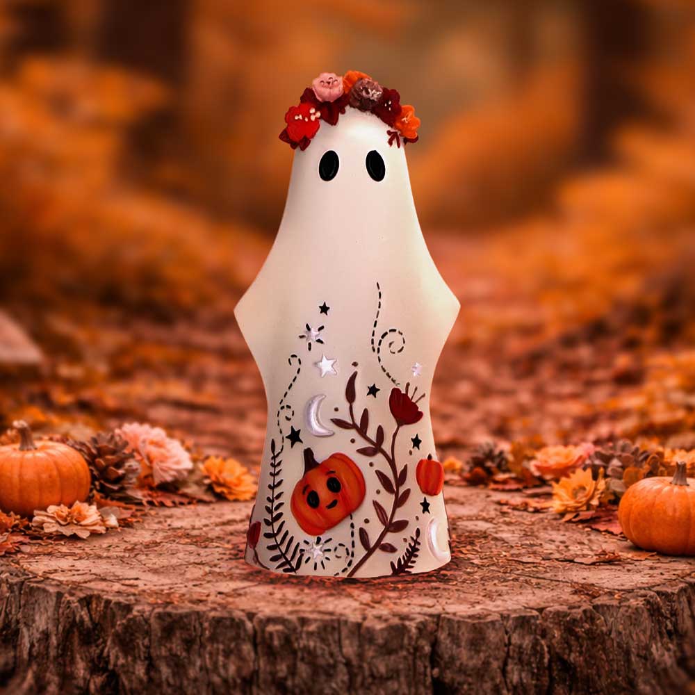 Boo-Who? Florence ghost figurine displayed with floral and pumpkin details