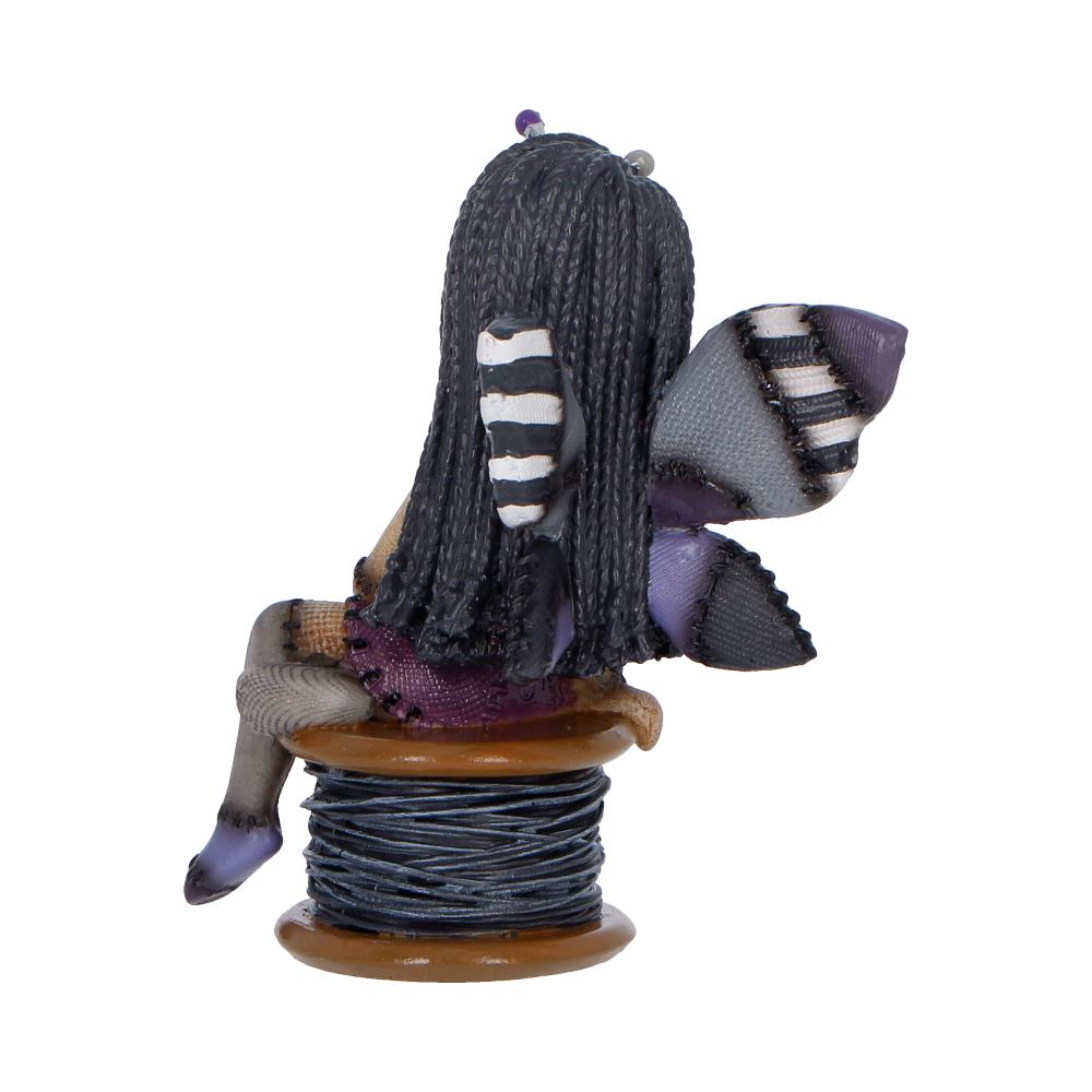 Back view of The Stitchlings Stitchy Belle figurine
