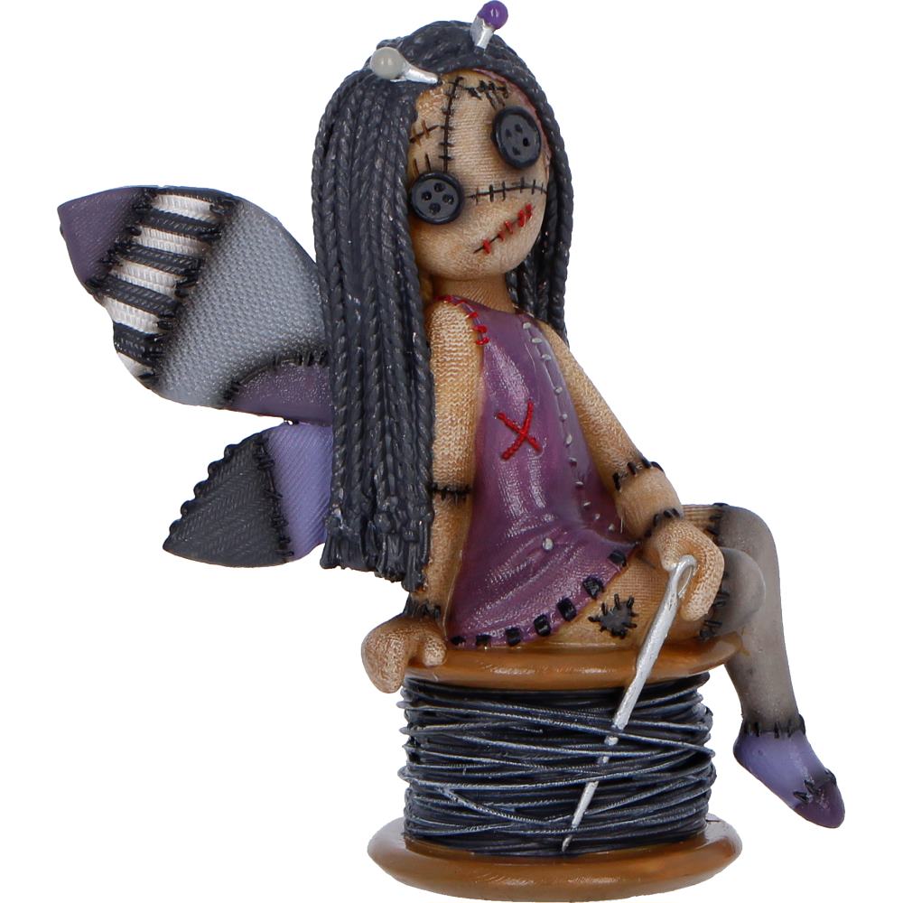 Cute spooky figurine on sewing thread spool