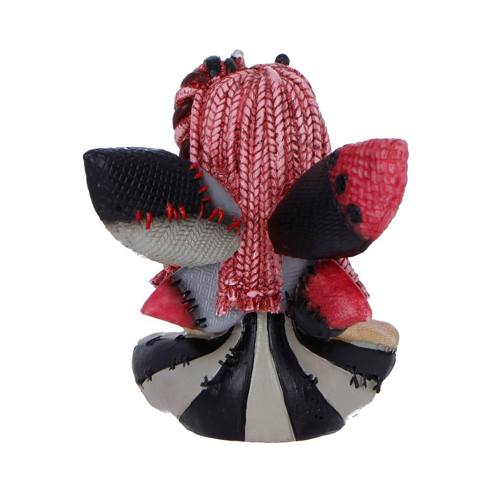 Back view of The Stitchlings Pinny Thimble figurine