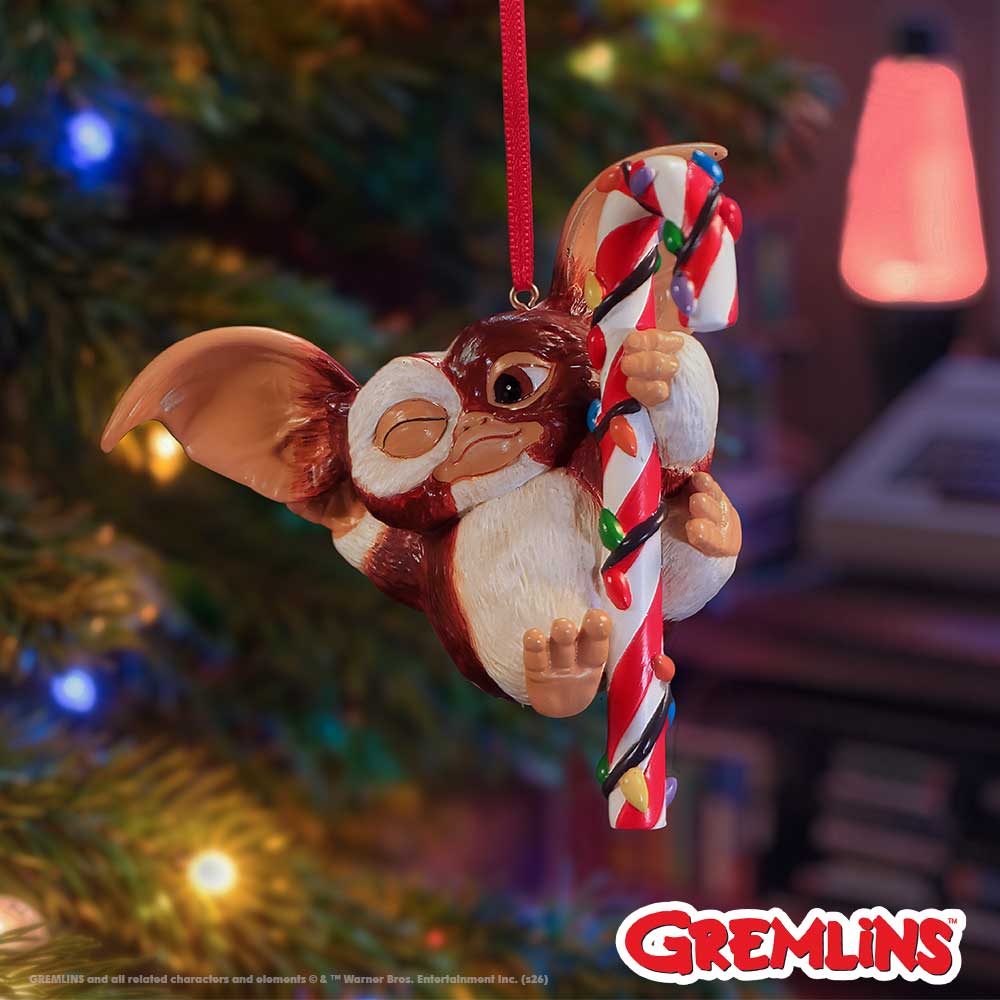 Christmas ornament of Official Gremlins Gizmo Festive Candy Cane Hanging Ornament showing the colourful fairy lights, red hanging ribbon, detailed sculpting, and premium hand-painted resin craftsmanship on display