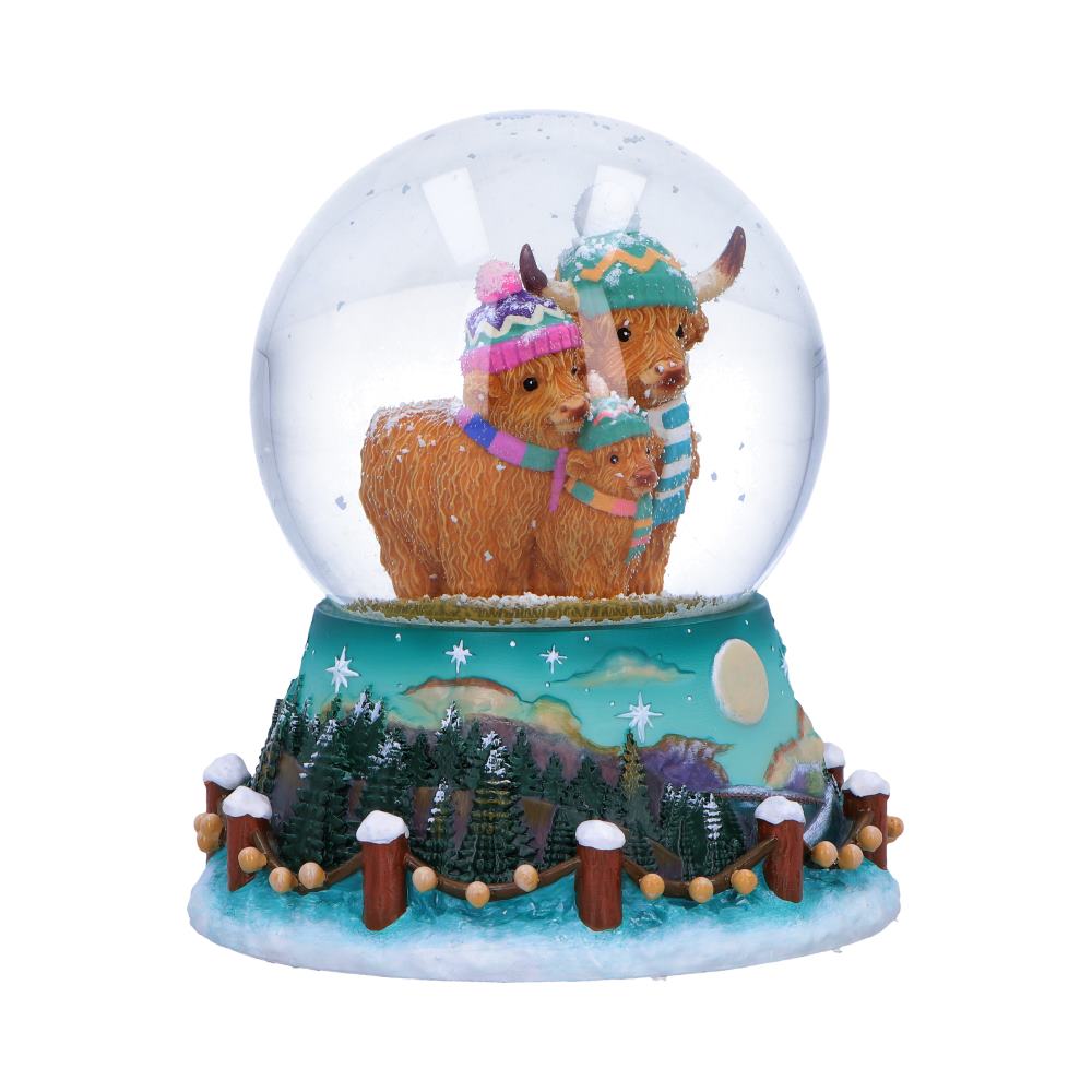 Winter Highland cow snow globe with hats and scarves