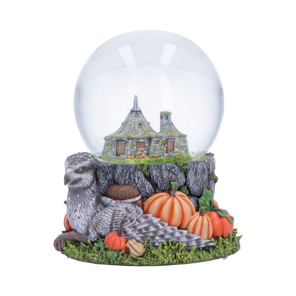 Harry Potter Hagrid’s Hut Snow Globe showing Buckbeak, pumpkins, barrels and Hagrid’s Hut