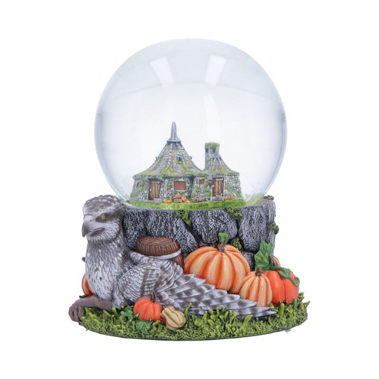 Harry Potter Hagrid’s Hut Snow Globe showing Buckbeak, pumpkins, barrels and Hagrid’s Hut