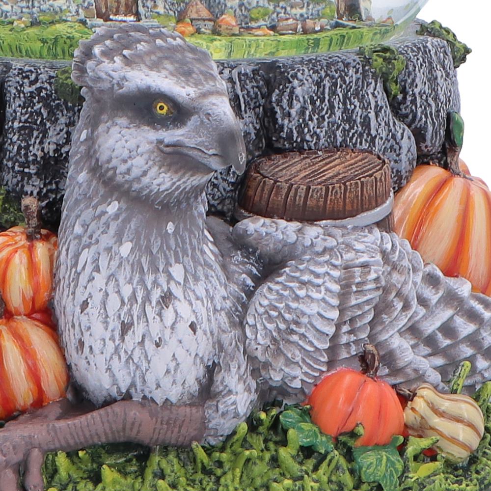Buckbeak resting at the front of the officially licensed Harry Potter Hagrid’s Hut Snow Globe