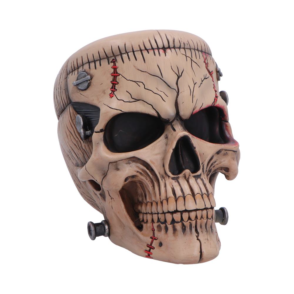 Hall of Horrors: The Monster of Madness Skull Figurine 15.1cm featuring Frankenstein-inspired stitched detailing, scars, neck bolts, and a premium hand-painted resin finish.