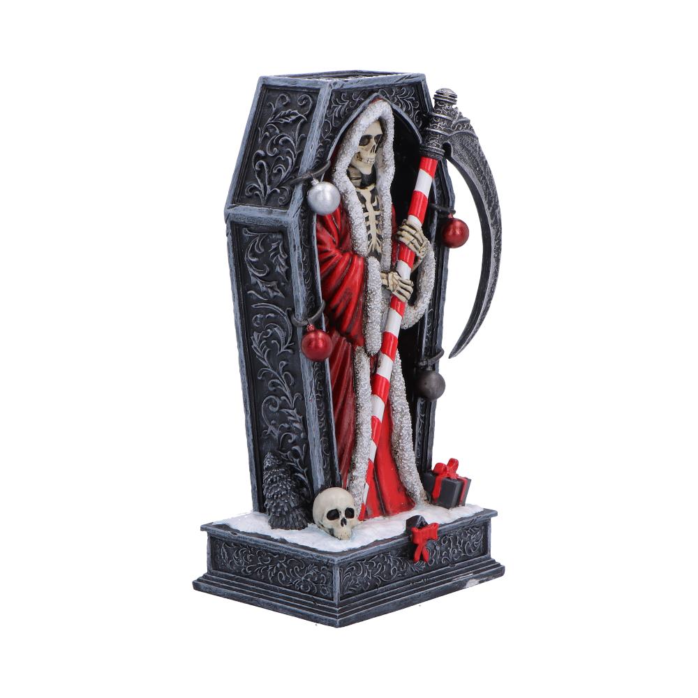 Gothic Christmas Reaper Skeleton figure in a coffin with candy cane and gift