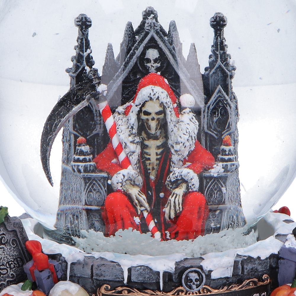 Skeleton in a red coat sitting on a throne inside a snow globe with gothic architecture.
