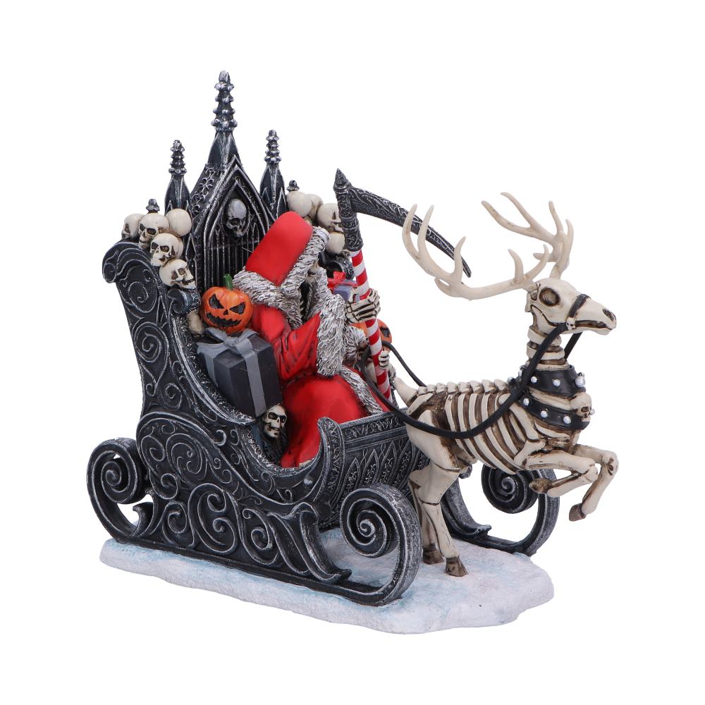 Side view of Skeleton reindeer with  Christmas-themed Santa Claus figure in a sleigh