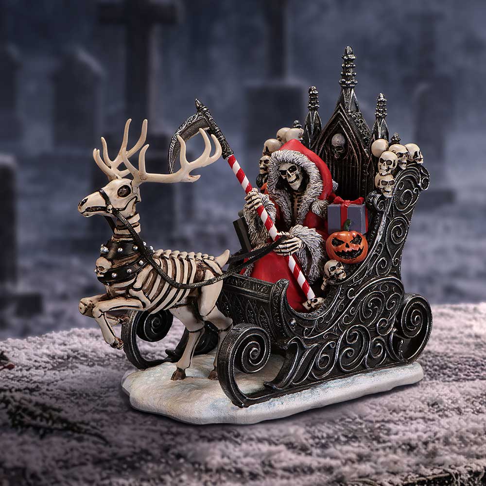 Skeleton figure in a festive sleigh with a skeleton reindeer on display