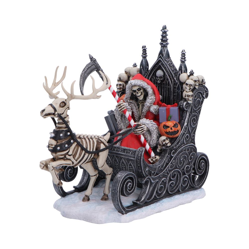 Silent Nightmares: Slay Bells Figurine 16cm featuring a Santa Reaper riding an ornate gothic sleigh pulled by a skeletal reindeer, complete with a candy cane scythe, snowy base, and premium hand-painted resin finish.