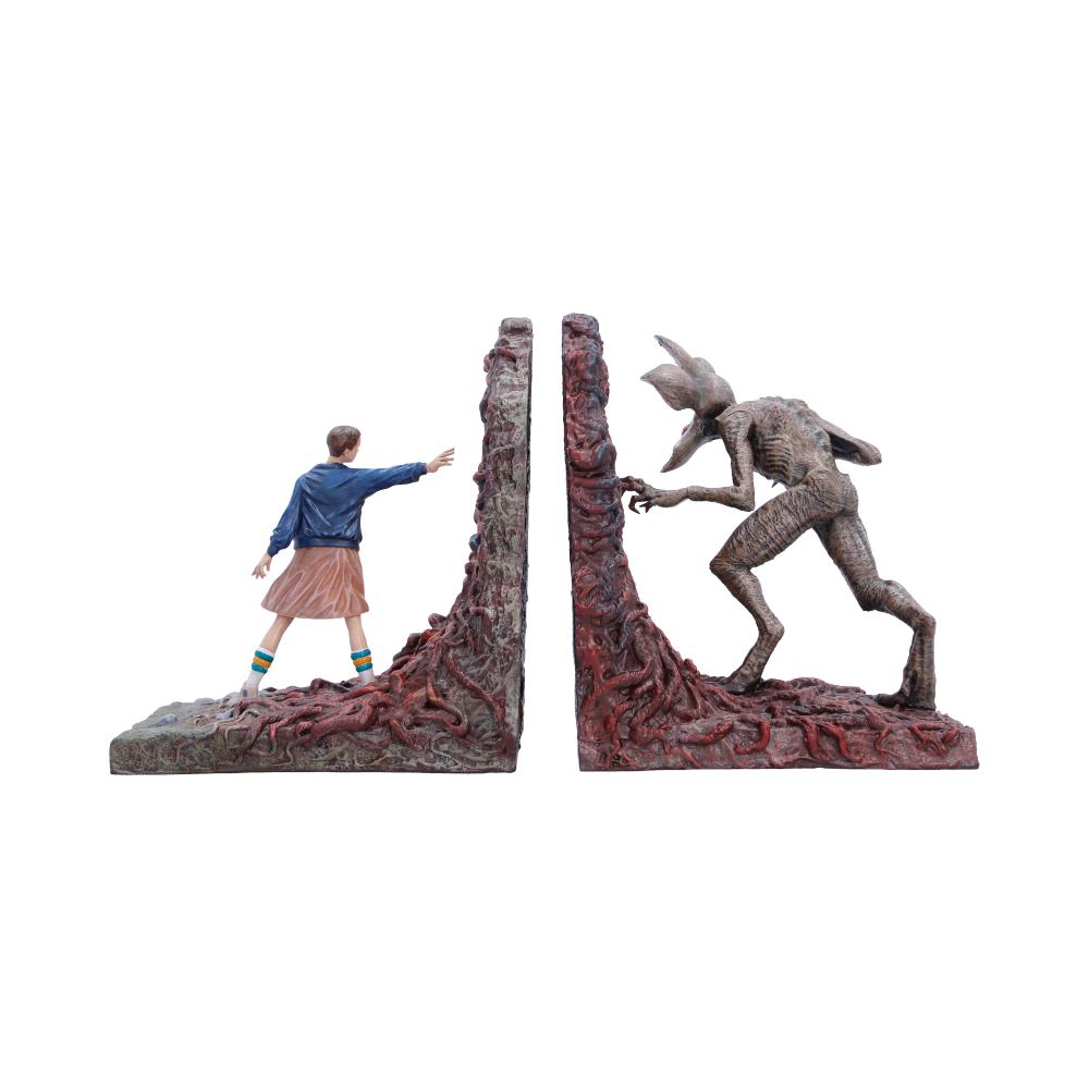 Rear view of Stranger Things bookends showing Eleven and the Demogorgon facing each other in the Upside Down.