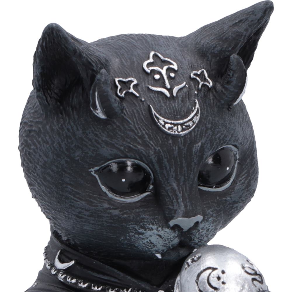 A black cat figurine with silver crescent moon and star designs on its forehead, wearing a black collar with a silver crescent pendant.