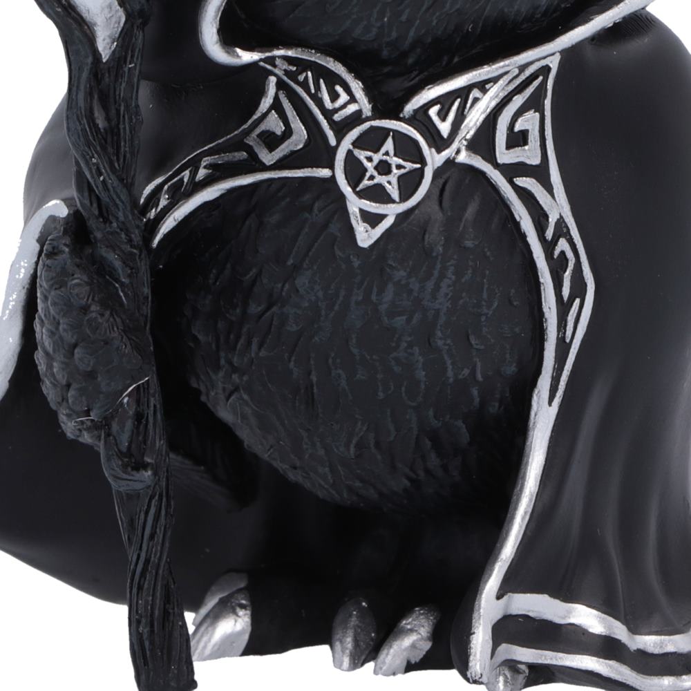 Close-up of Featheros gothic figurine with silver painted details, including a pentagram symbol on the chest, silver claws, holding a magical staff.