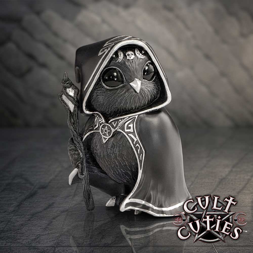 Featheros Cult Cuties gothic black owl figurine dressed in a hooded cloak with silver trim, holding a staff figurine gift for fantasy and gothic lovers on display