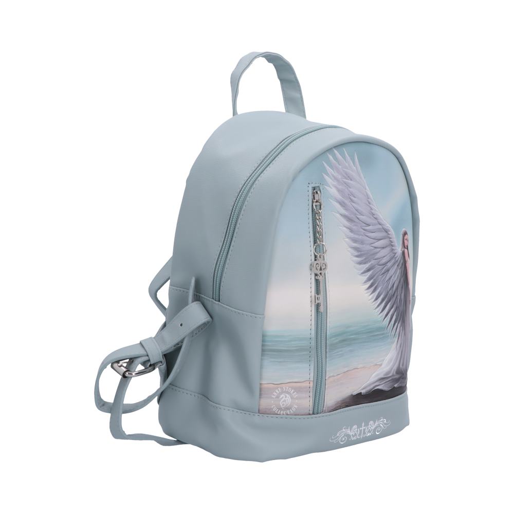 A light blue backpack featuring a printed graphic of a white-winged angel standing on a beach, with silver zipper pulls and a matching adjustable shoulder strap.