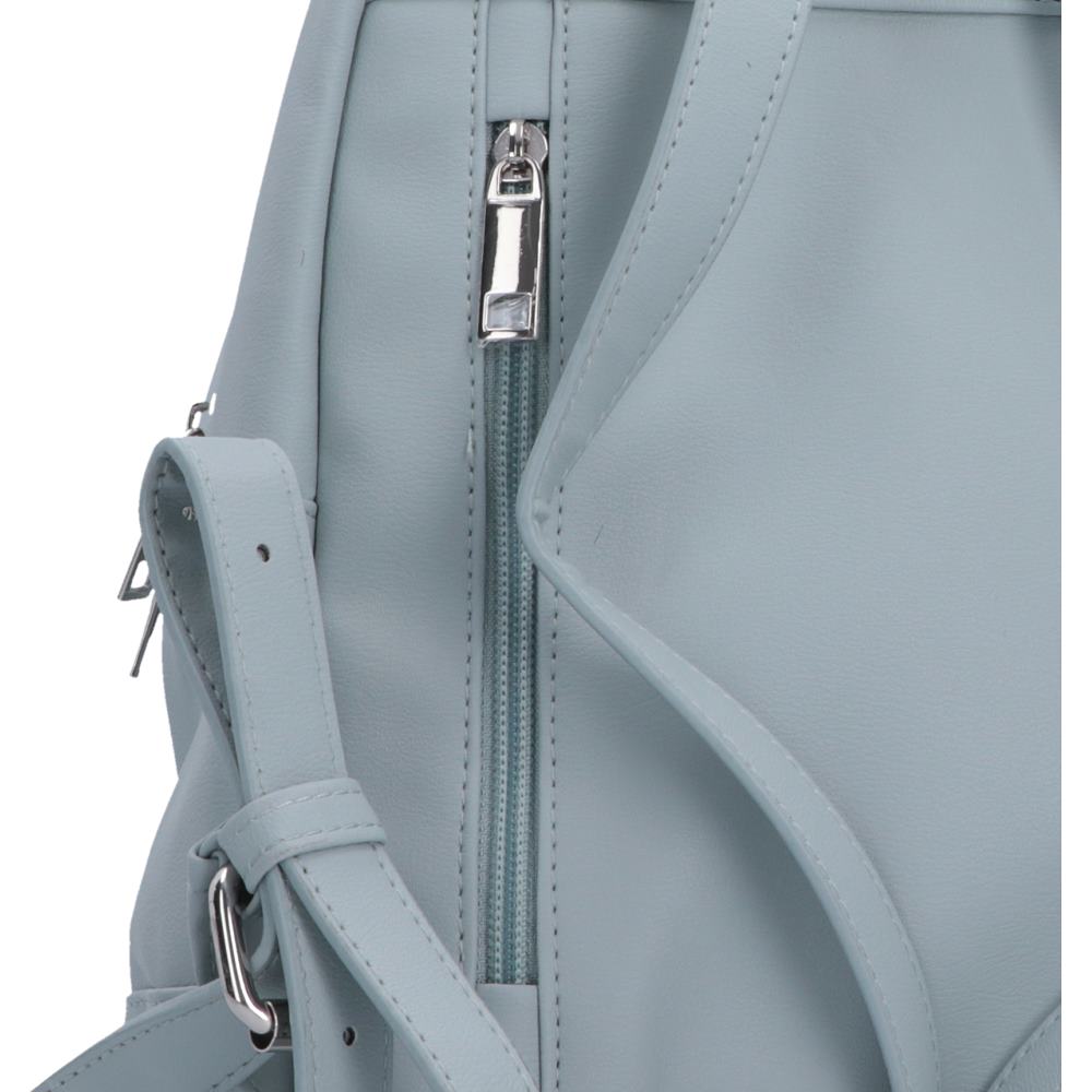 Close-up of a light blue-gray backpack showing a vertical zipper with a silver pull, side strap detail, and clean stitching.