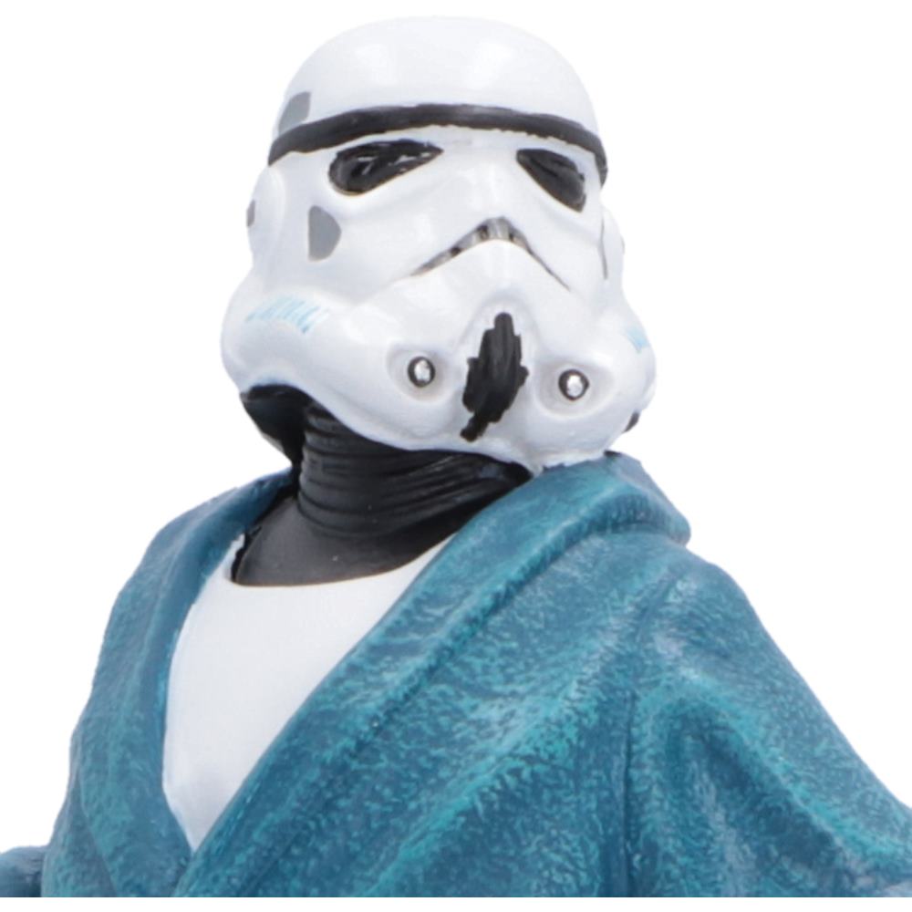 A close-up of a Star Wars humorous Original Stormtrooper off-duty character figure wearing a teal blue robe over a white undershirt