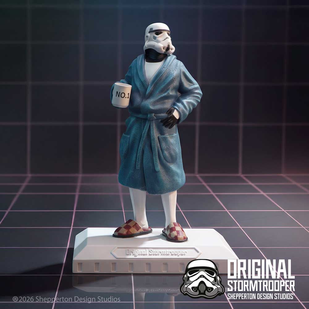 A Star Wars themed figurine of a Original Stormtrooper Off Duty dressed in a sparkling teal blue bathrobe, white tights, and patterned slippers, holding a mug that says 'NO.1' on display