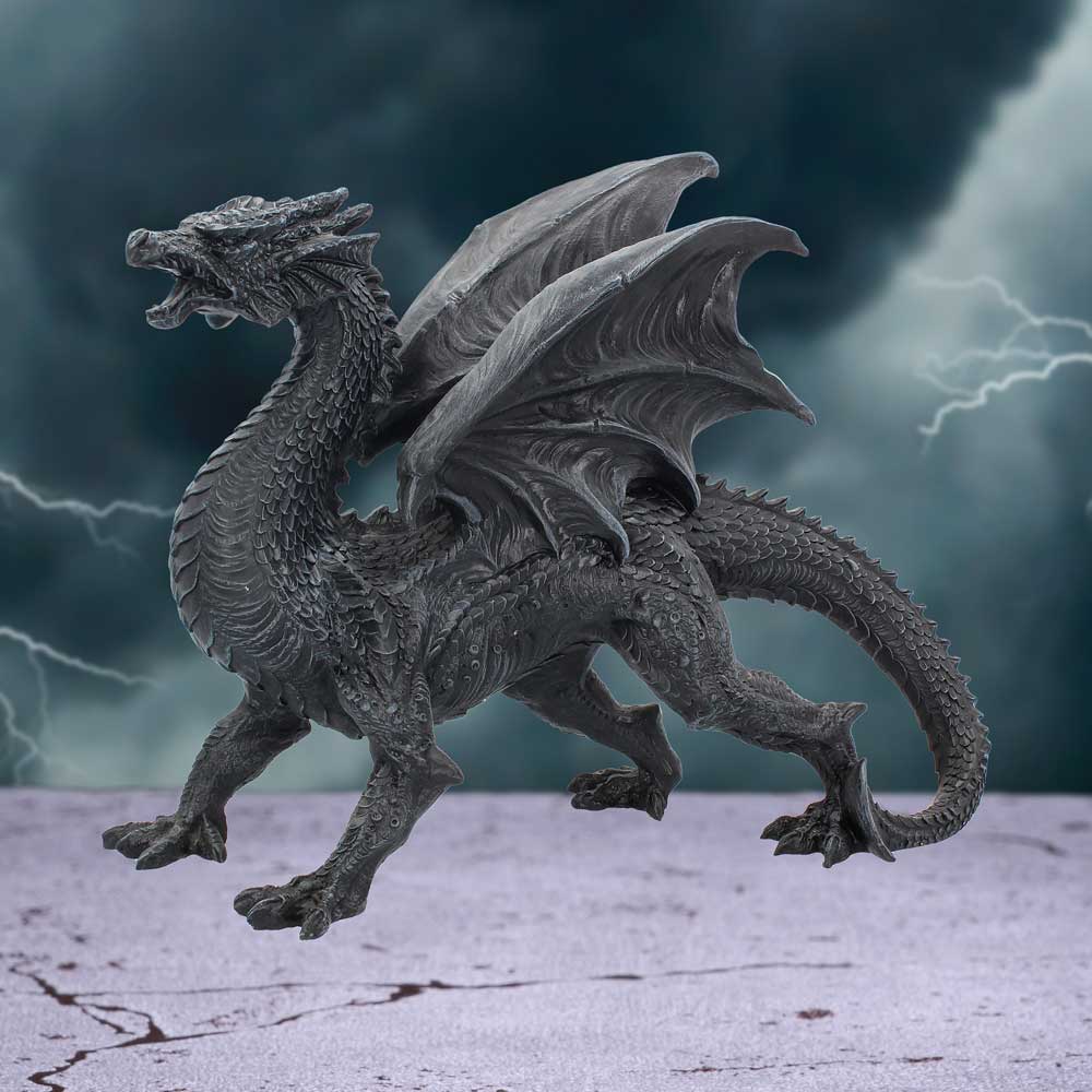 Large gothic black dragon figure with wings raised and talons visible on display