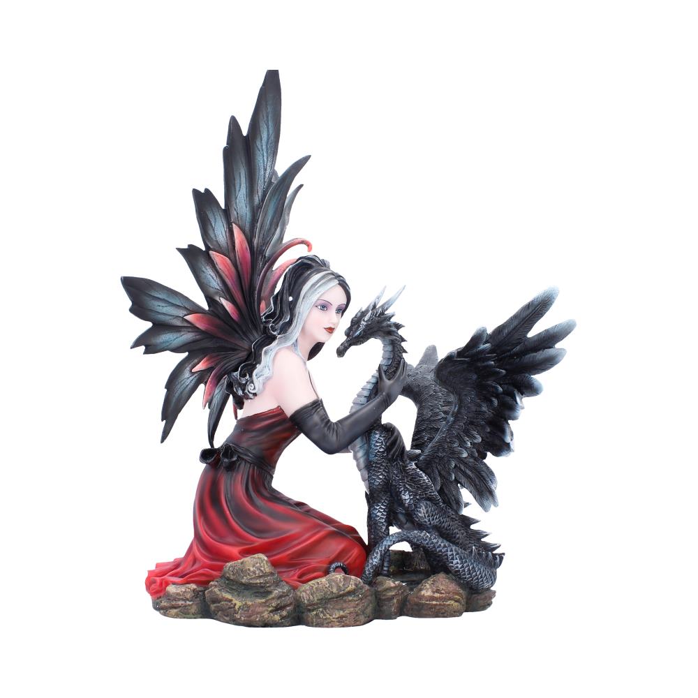Gothic fairy figurine kneeling beside black dragon detail