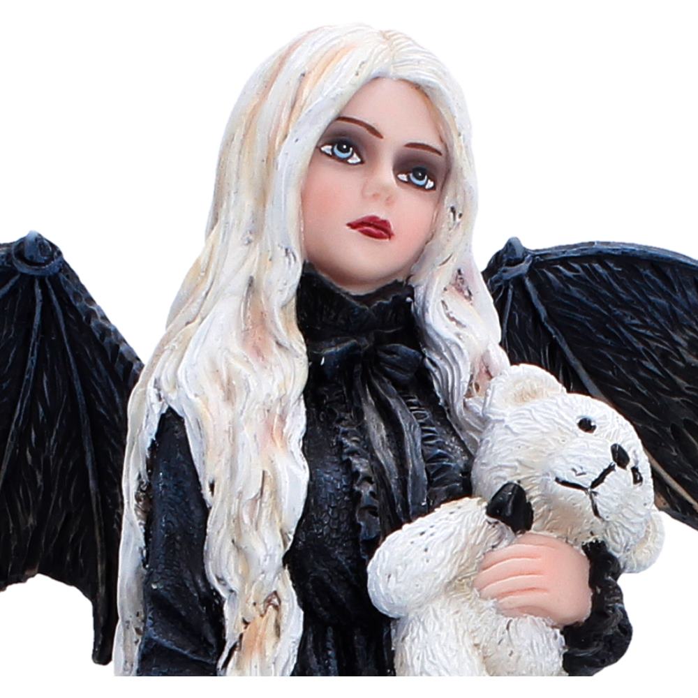 Close-up of Gentle Hold fairy face and teddy bear