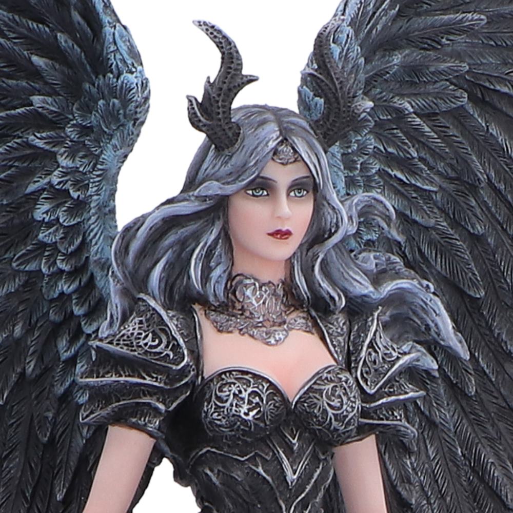 Close-up of gothic angel face and blade detail