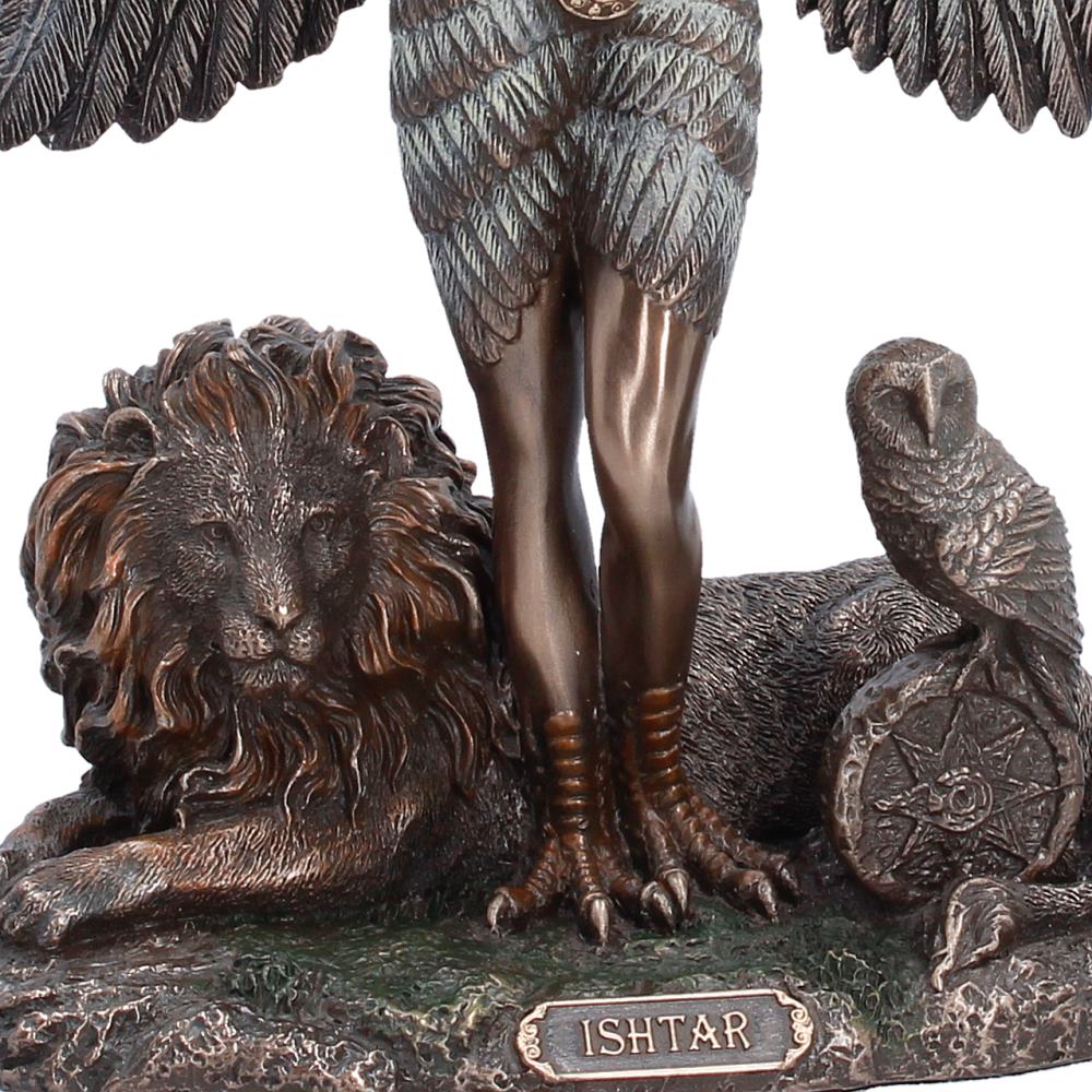 Statue of Ishtar with lion and owl, featuring detailed craftsmanship