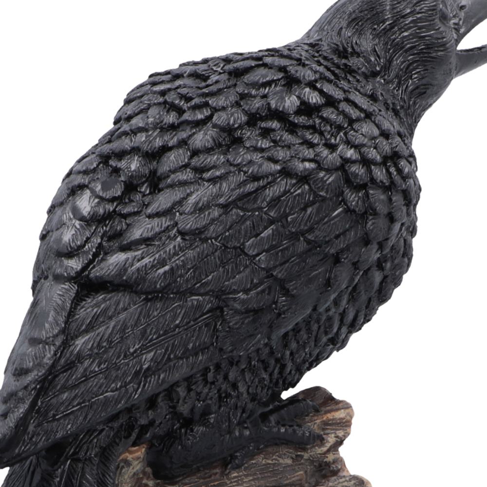 Detailed black plumage on Raven’s Caw figurine