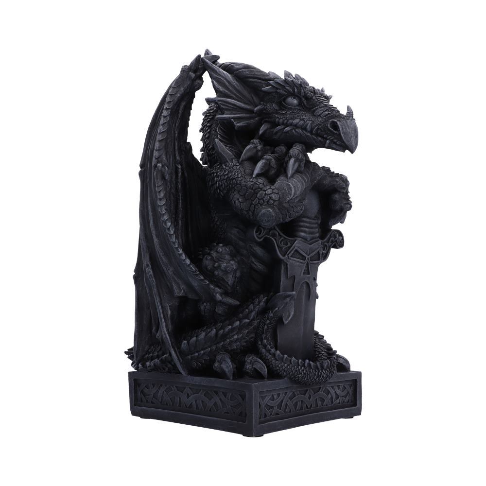 A black dragon figurine coiled around a large sword on a decorative rectangular base