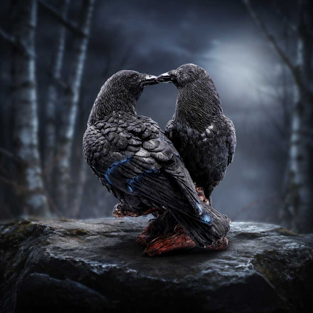Midnight Kiss two-raven figurine displayed on a detailed branch