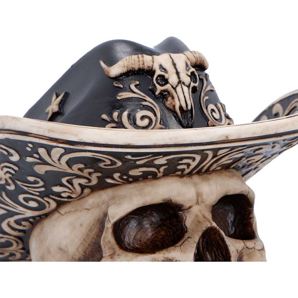 Cowboy hat skull figurine with miniature bull skull detail