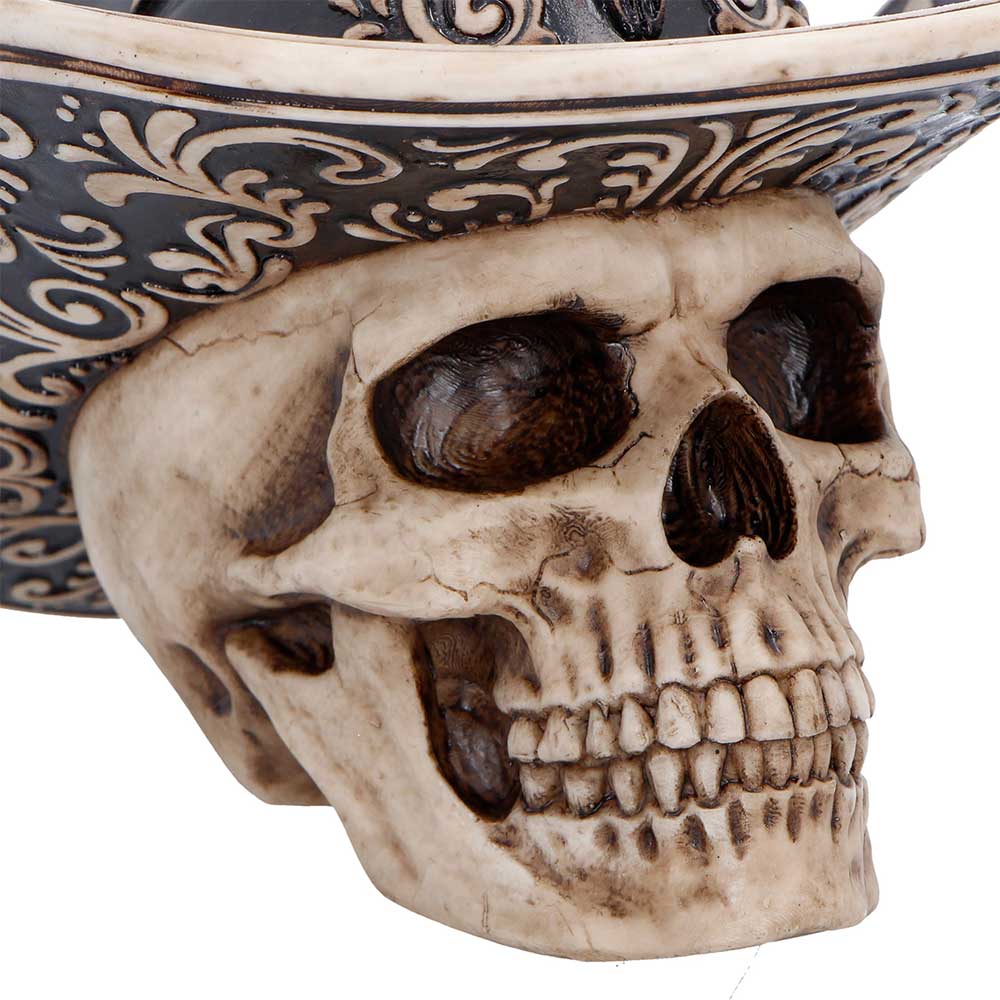 Wild West skull figurine close-up showing aged bone finish