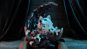 360° view of the Winter Moon 20cm wolf and pups figurine showcasing four wolf pups, a protective adult wolf and shimmering crescent moon.
