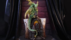 360° view of the Draconis Arcanum Figurine showcasing the green dragon, ancient castle ruins, intricate sculpting, and hand-painted resin craftsmanship.